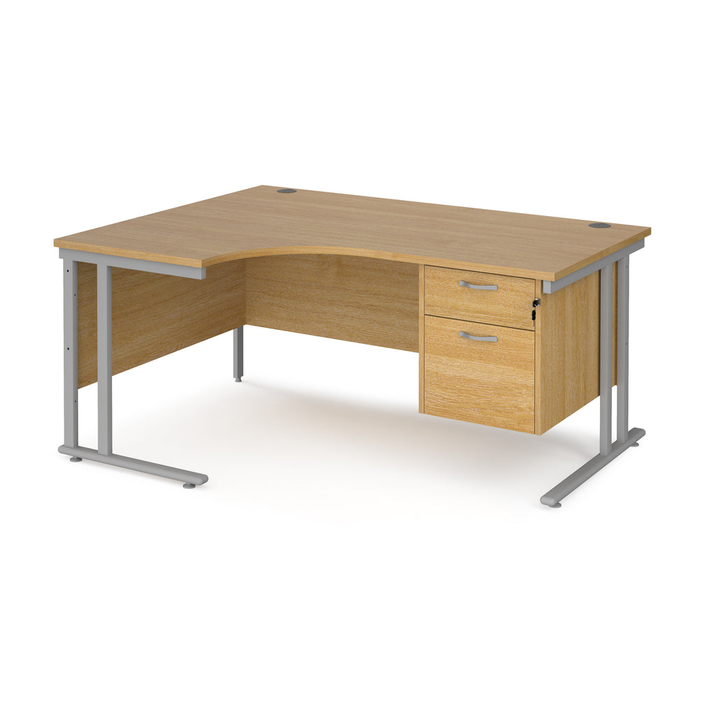Ergonomic desk with wood-effect top and matching pedestal with silver frame on a white background