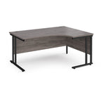 Corner office desk with wooden top and black metal legs on a white background