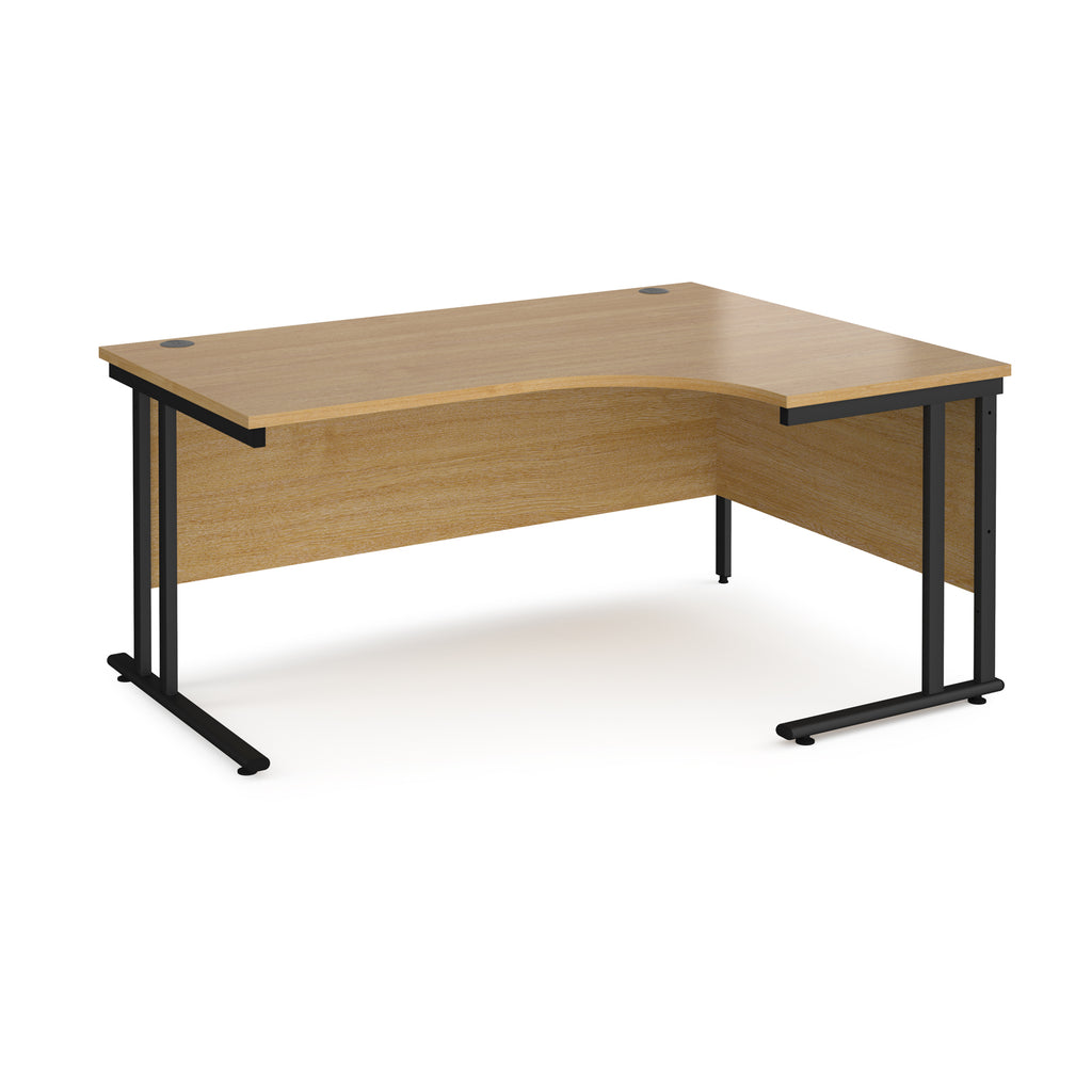 Wooden corner desk with black metal legs on a white background