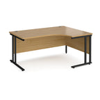 Wooden corner desk with black metal legs on a white background