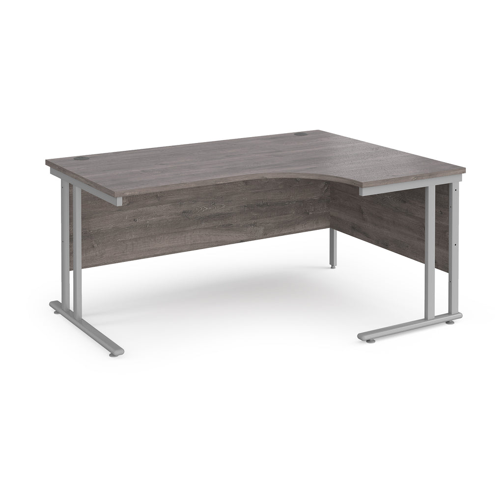 Corner office desk with wooden surface and metal legs on a white background