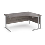 Corner office desk with wooden surface and metal legs on a white background