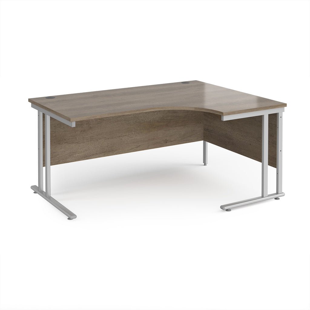 Corner office desk with wooden top and metal frame on a white background