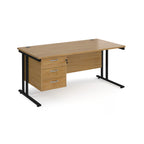 Wooden office desk with black legs and fixed pedestal on a white background
