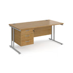 Wooden office desk with silver legs and fixed pedestal on a white background