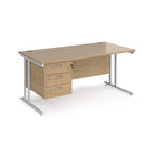 Wooden office desk with silver legs and fixed pedestal on a white background