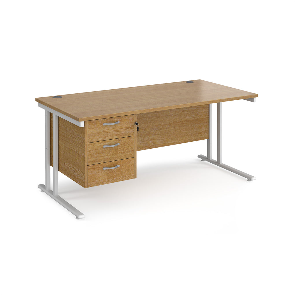 Wooden office desk with silver legs and fixed pedestal on a white background