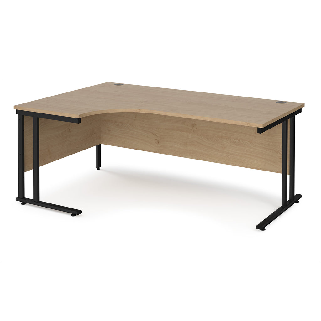 Corner office desk with wooden surface and black metal legs on a white background