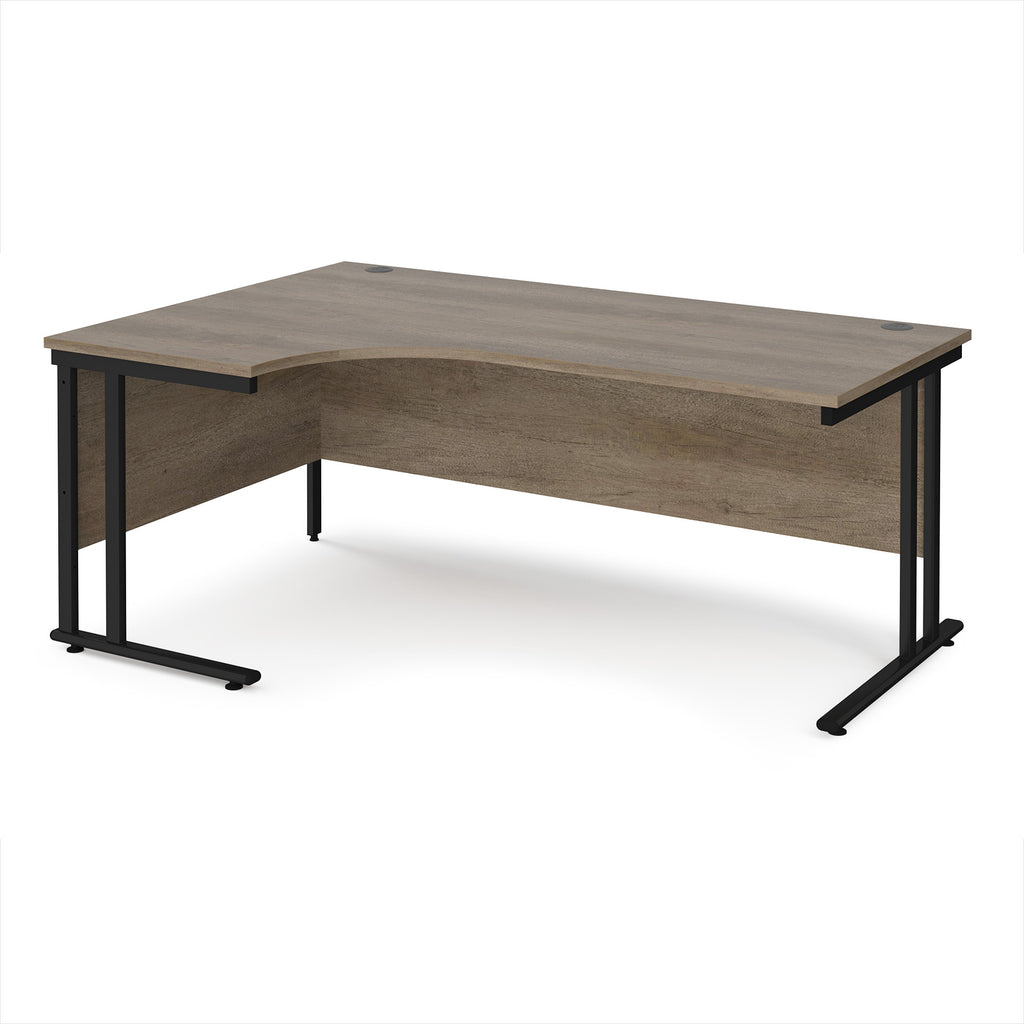 Corner desk with wooden top and black metal legs on a white background