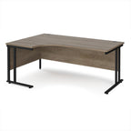 Corner desk with wooden top and black metal legs on a white background