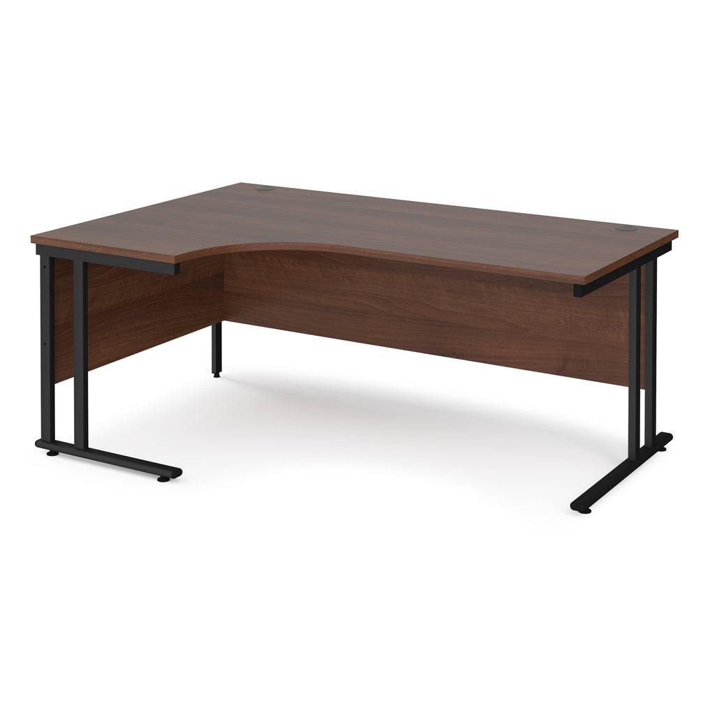 Wooden corner desk with black metal legs on a white background