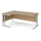 Wooden corner desk with metal legs on a white background