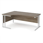 Corner office desk with wooden top and white metal legs on a white background