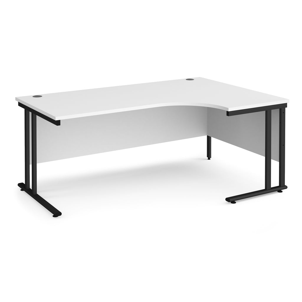 White corner desk with black metal legs on a white background