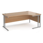 Wooden corner desk with metal legs on a white background