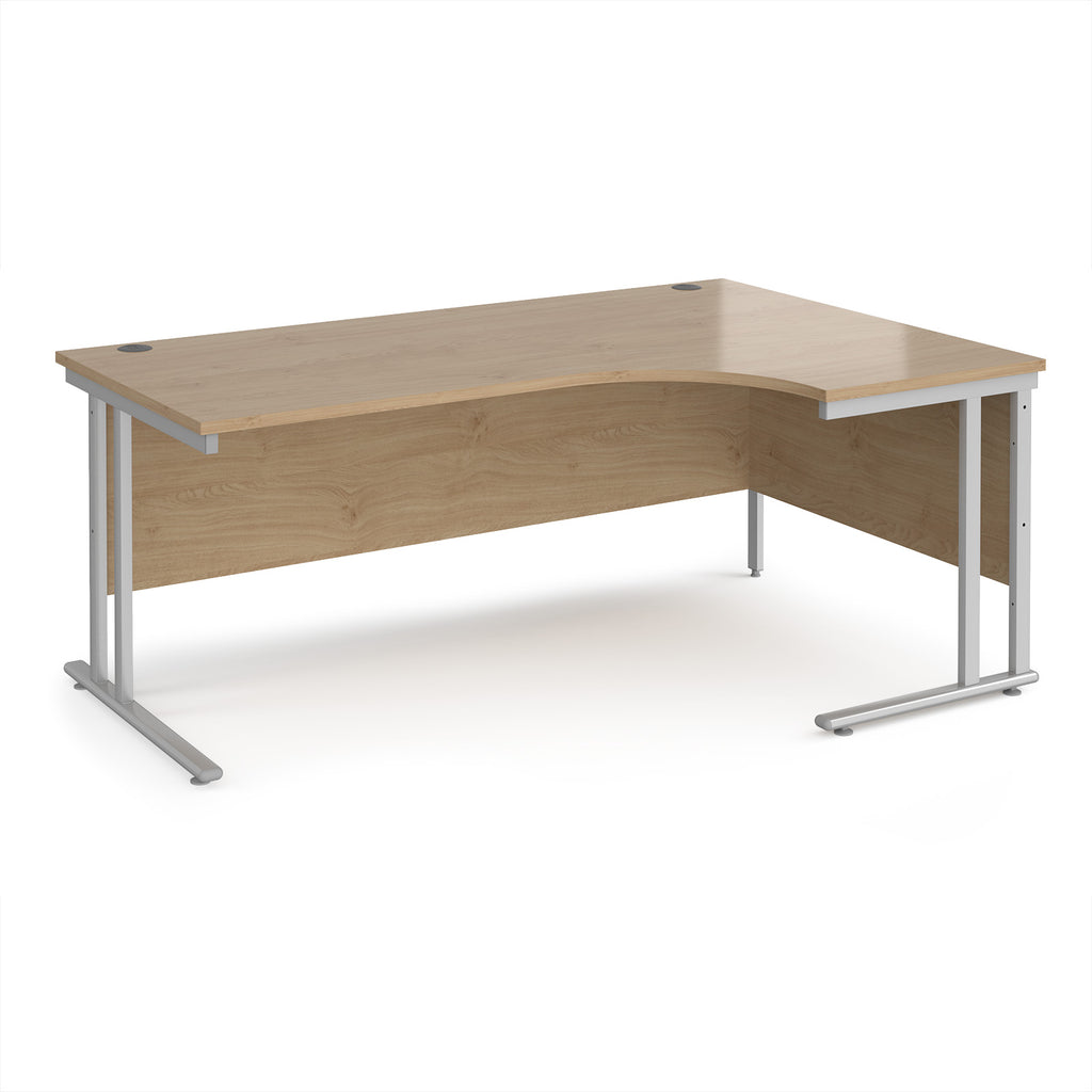 Wooden corner desk with metal legs on a white background