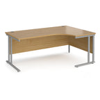 Wooden corner desk with metal legs on a white background