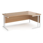 Wooden corner desk with white metal legs on a white background