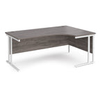 Corner office desk with wooden surface and white metal frame on a white background