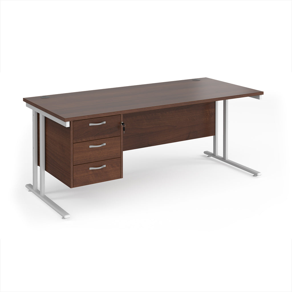 Wooden office desk with metal legs and three drawers on a white background