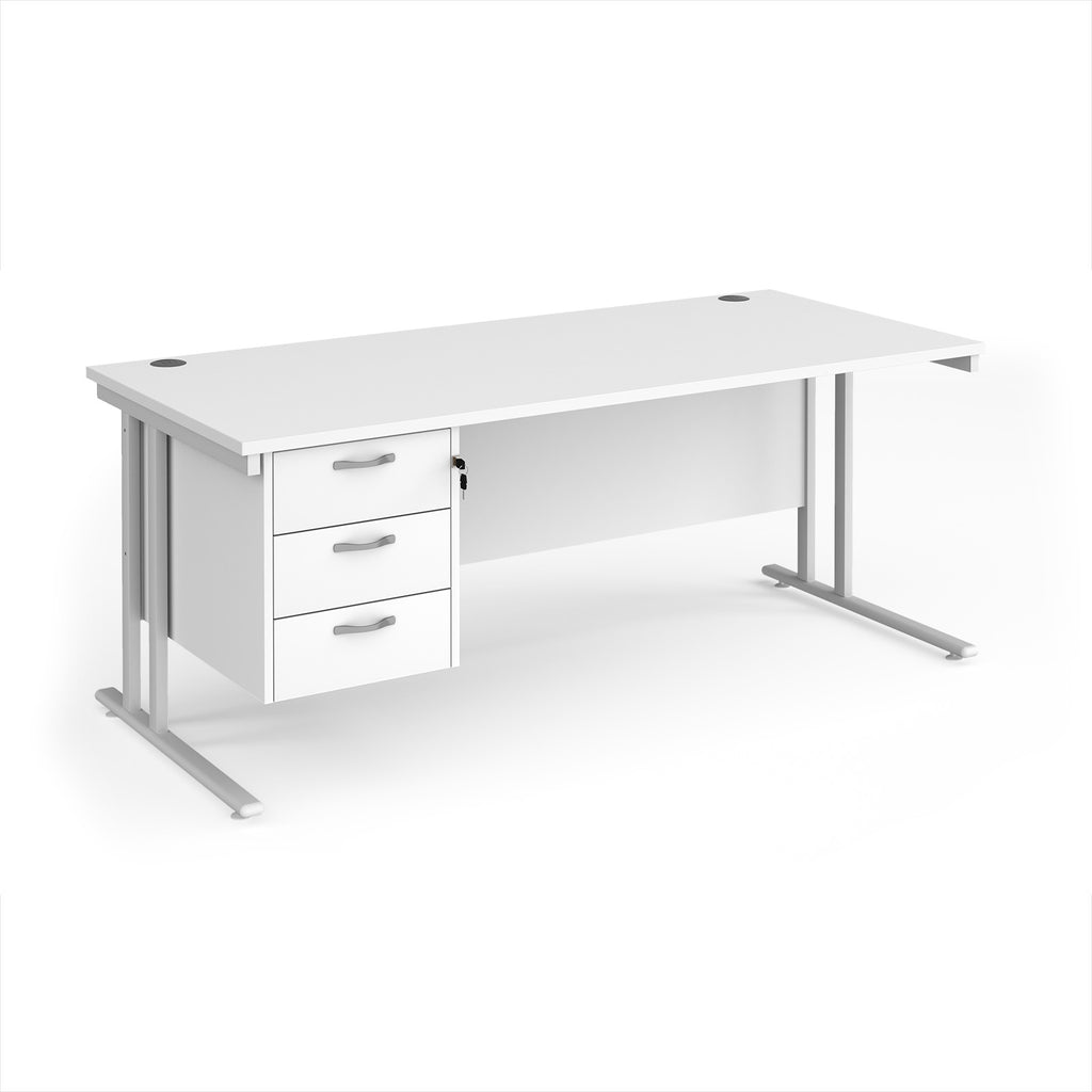White office desk with three drawers on a white background