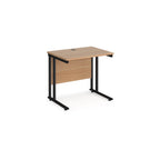 Wooden desk with black legs on a white background