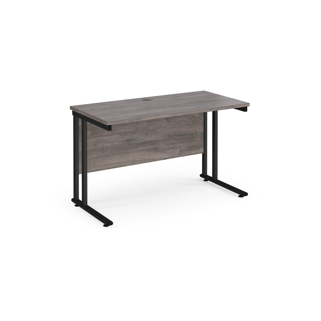 Wooden desk with black metal legs on a white background