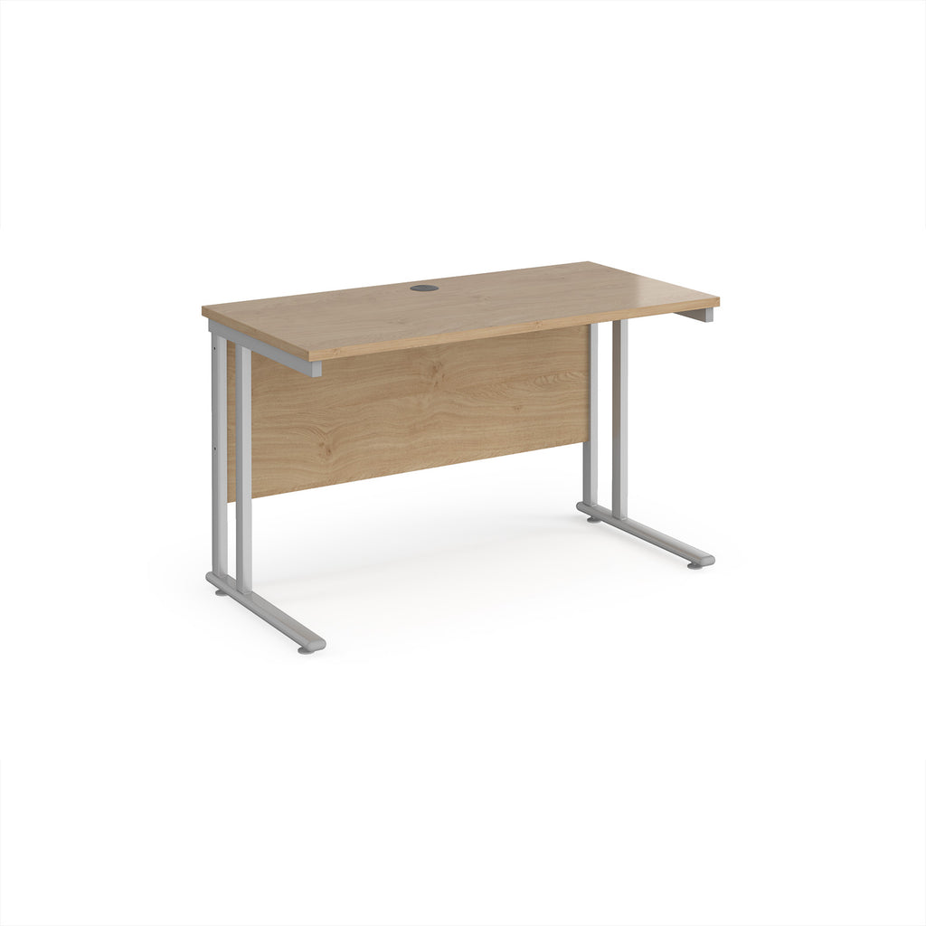 Wooden desk with silver metal legs on a white background