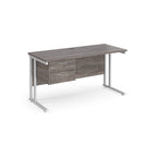 Office desk with grey wood-effect top and matching pedestal with white frame on a white background