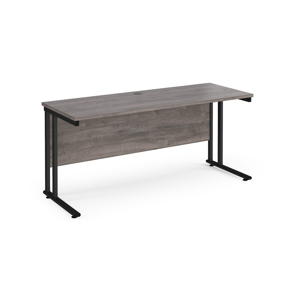 Wooden desk with black metal legs on a white background