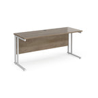 Wooden desk with white metal legs on a white background
