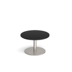Coffee table with black top and metal frame on a white background