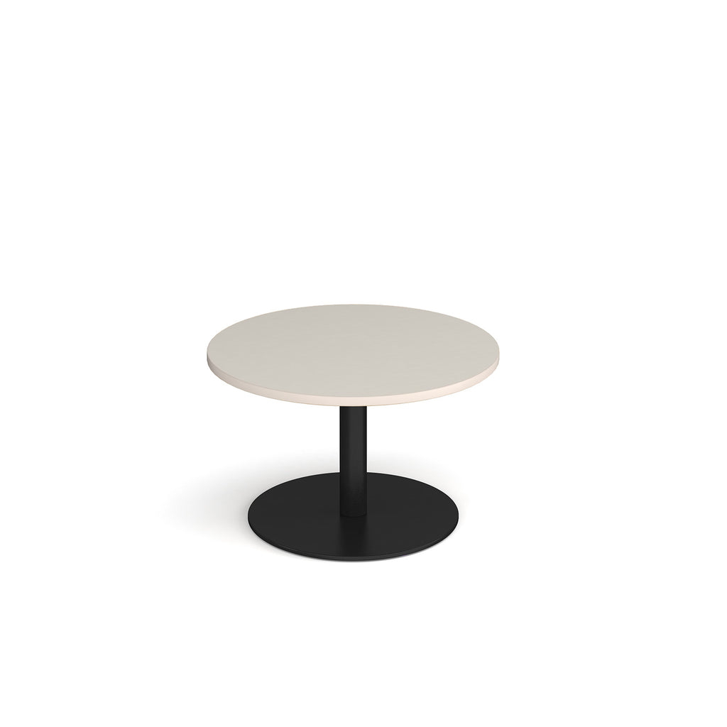 Coffee table with light grey top and black frame on a white background