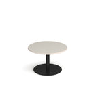 Coffee table with light grey top and black frame on a white background