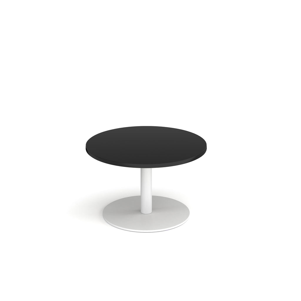 Coffee table with black top and white frame on a white background