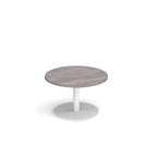 Coffee table with grey wood-effect top and white frame on a white background