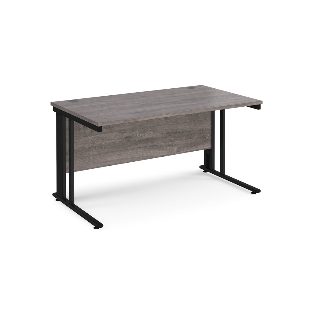 Office desk with grey wood-effect top and black metal legs on a white background