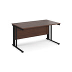 Office desk with wood-effect top and black metal legs on a white background