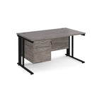 Office desk with grey wood-effect top and matching pedestal with black frame on a white background