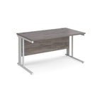 Office desk with grey wood-effect top and white metal legs on a white background