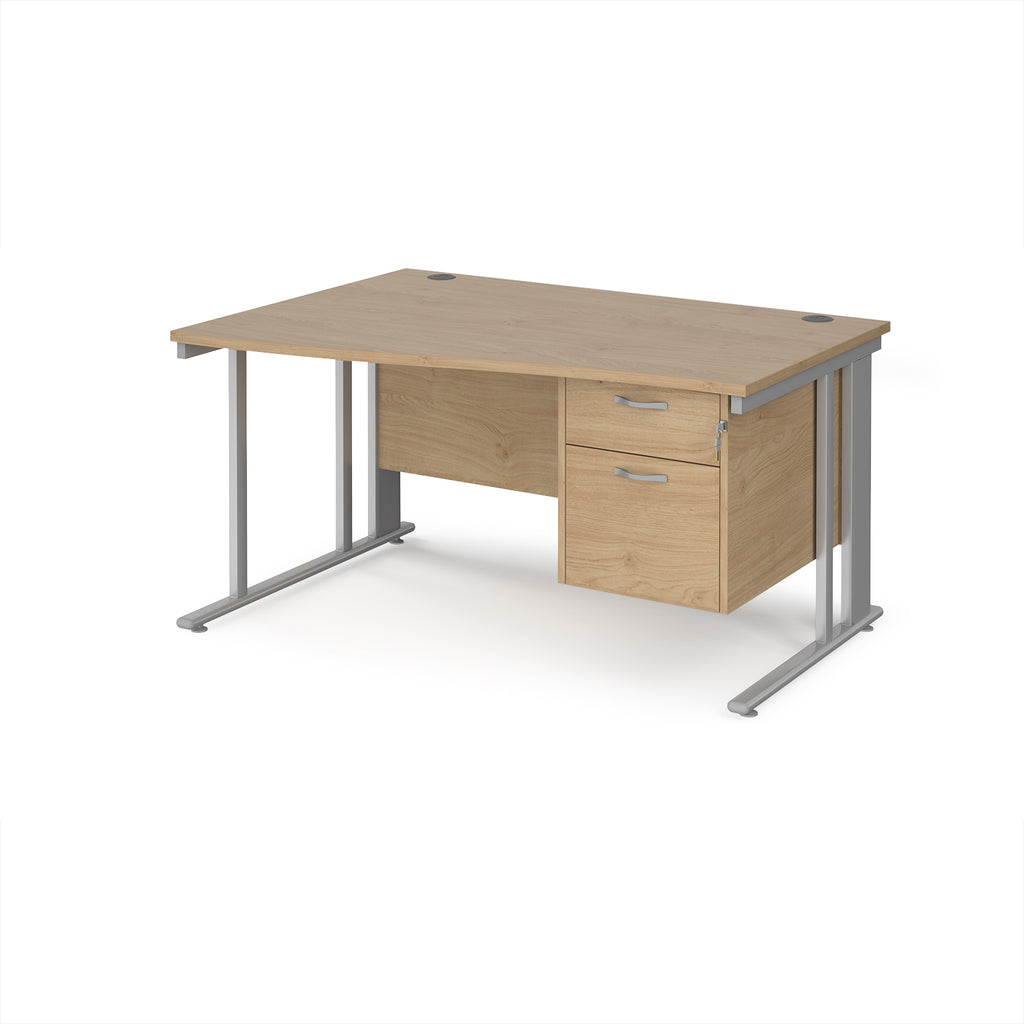 Wave desk with wood-effect top and matching pedestal with silver frame on a white background