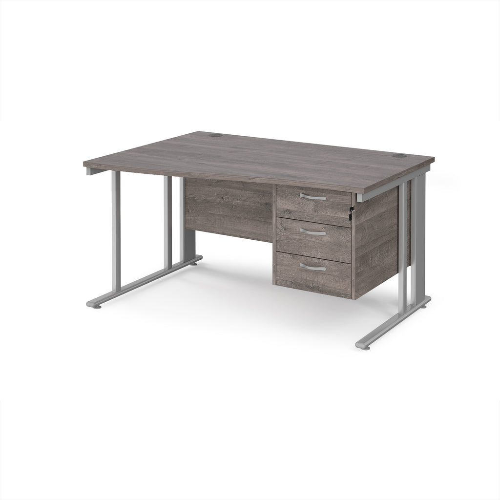 Wave desk with grey wood-effect top and matching pedestal with silver frame on a white background