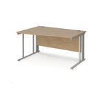 Wave desk with wood-effect top and silver metal frame on a white background
