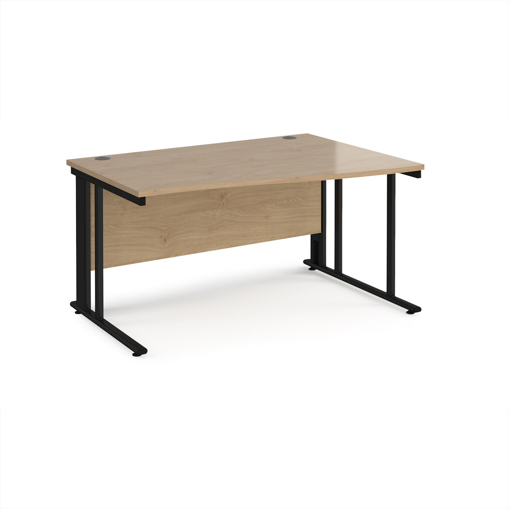 Wave desk with wood-effect top and black metal frame on a white background