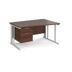 Wave desk with wood-effect top and matching pedestal with white frame on a white background