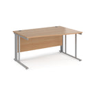 Wave desk with wood-effect top and silver metal frame on a white background
