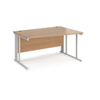 Wave desk with wood-effect top and white metal frame on a white background