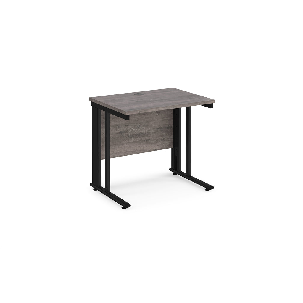 Office desk with grey wood-effect top and black legs on a white background