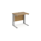 Office desk with wood-effect top and silver metal legs on a white background