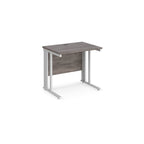 Office desk with grey wood-effect top and white metal legs on a white background